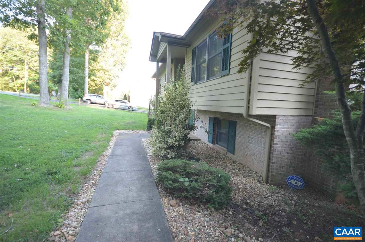 389 Morning Glory Road Ruckersville, VA 22968 - Photo 21 of 34 a front view of a house with a yard