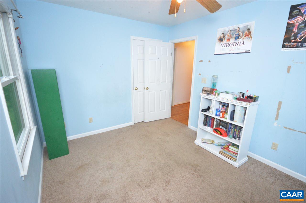 389 Morning Glory Road Ruckersville, VA 22968 - Photo 29 of 34 a room with a book shelf and a book shelf