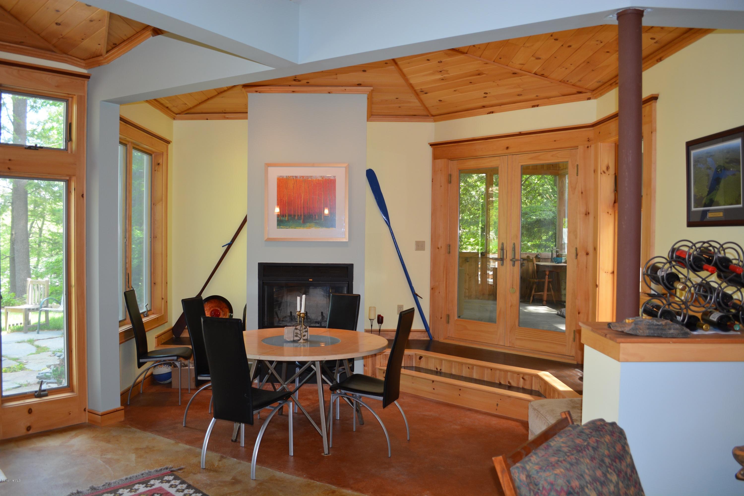 317 Pine Road Otis, MA 01029 - Photo 6 of 27 a view of a dining room with furniture and a window