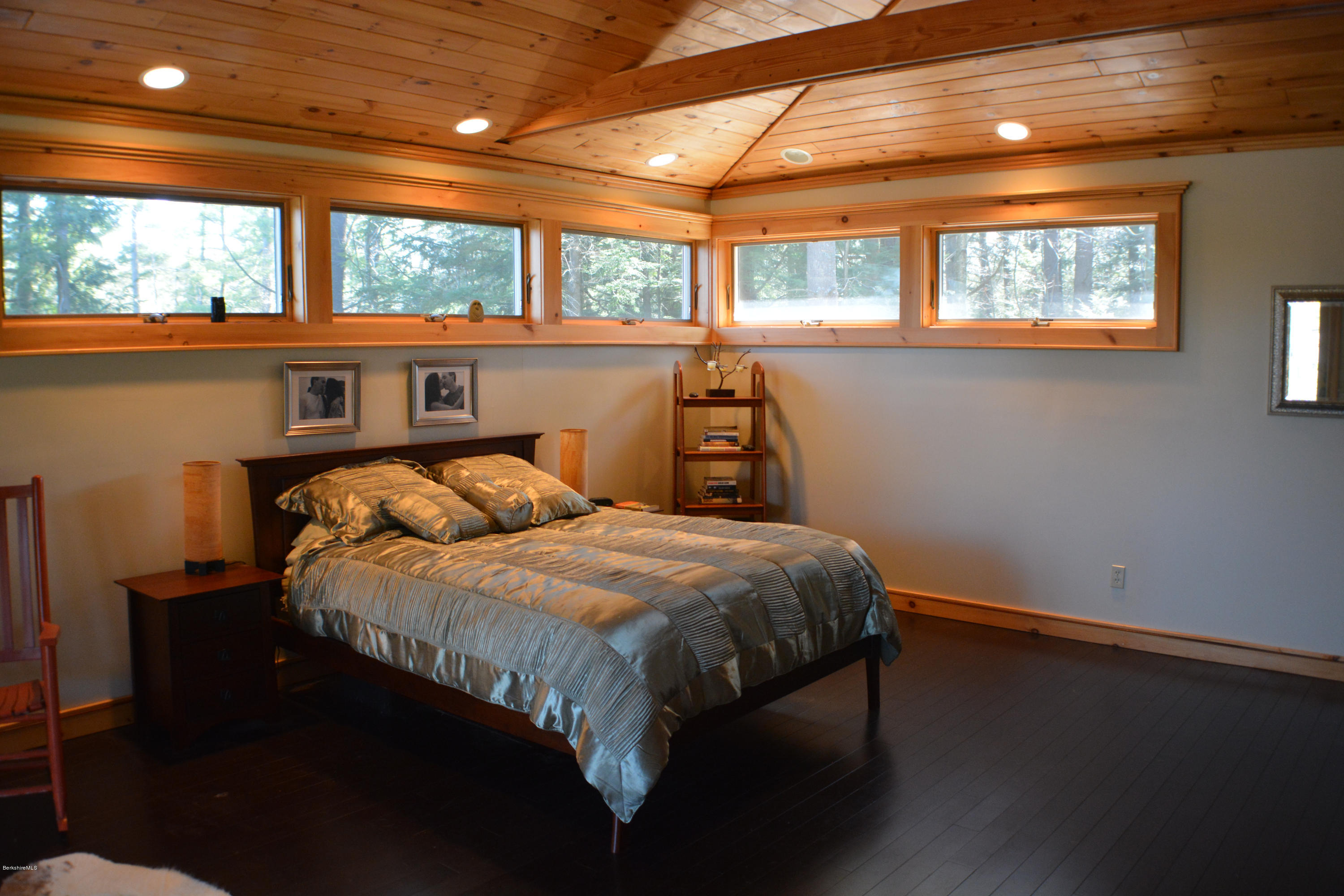 317 Pine Road Otis, MA 01029 - Photo 8 of 27 a bedroom with a bed and a large window