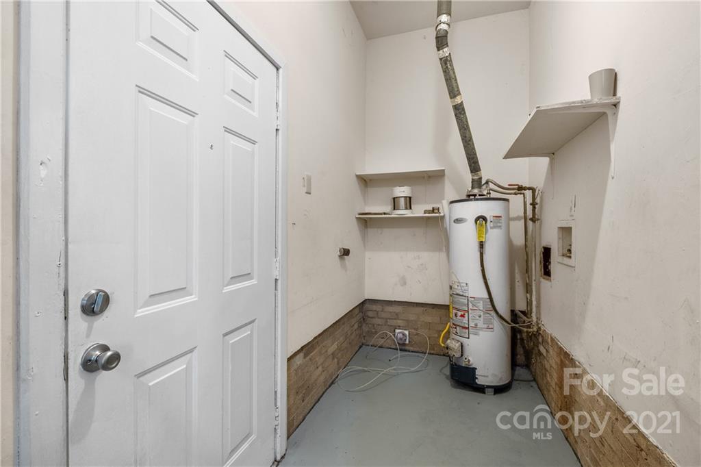 6833 Idlewild Road Charlotte, NC 28212 - Photo 11 of 24 a view of a room with water heater