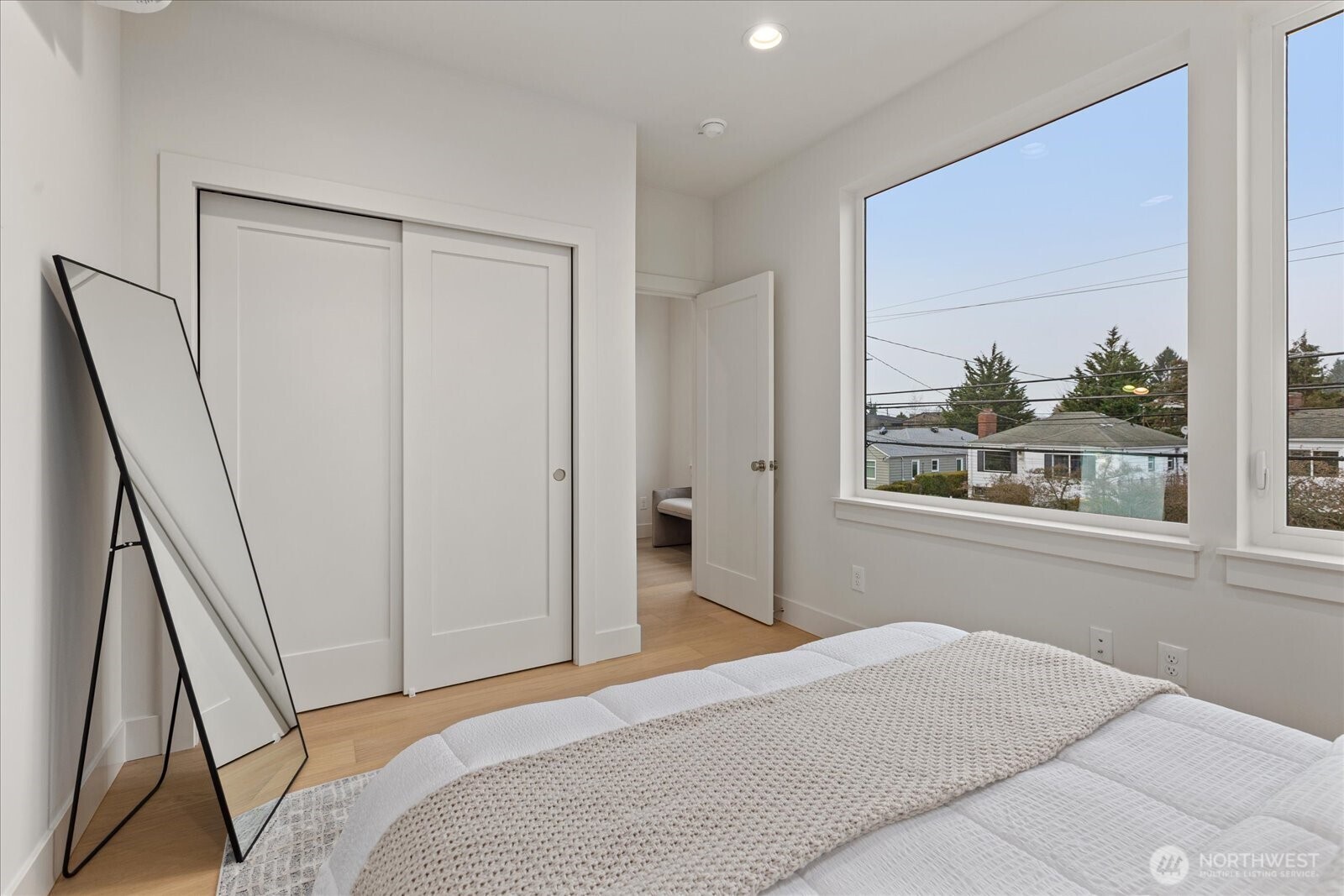 3409 Northwest 57th Street Seattle, WA 98107 - Photo 24 of 39 a bedroom with a bed and a window