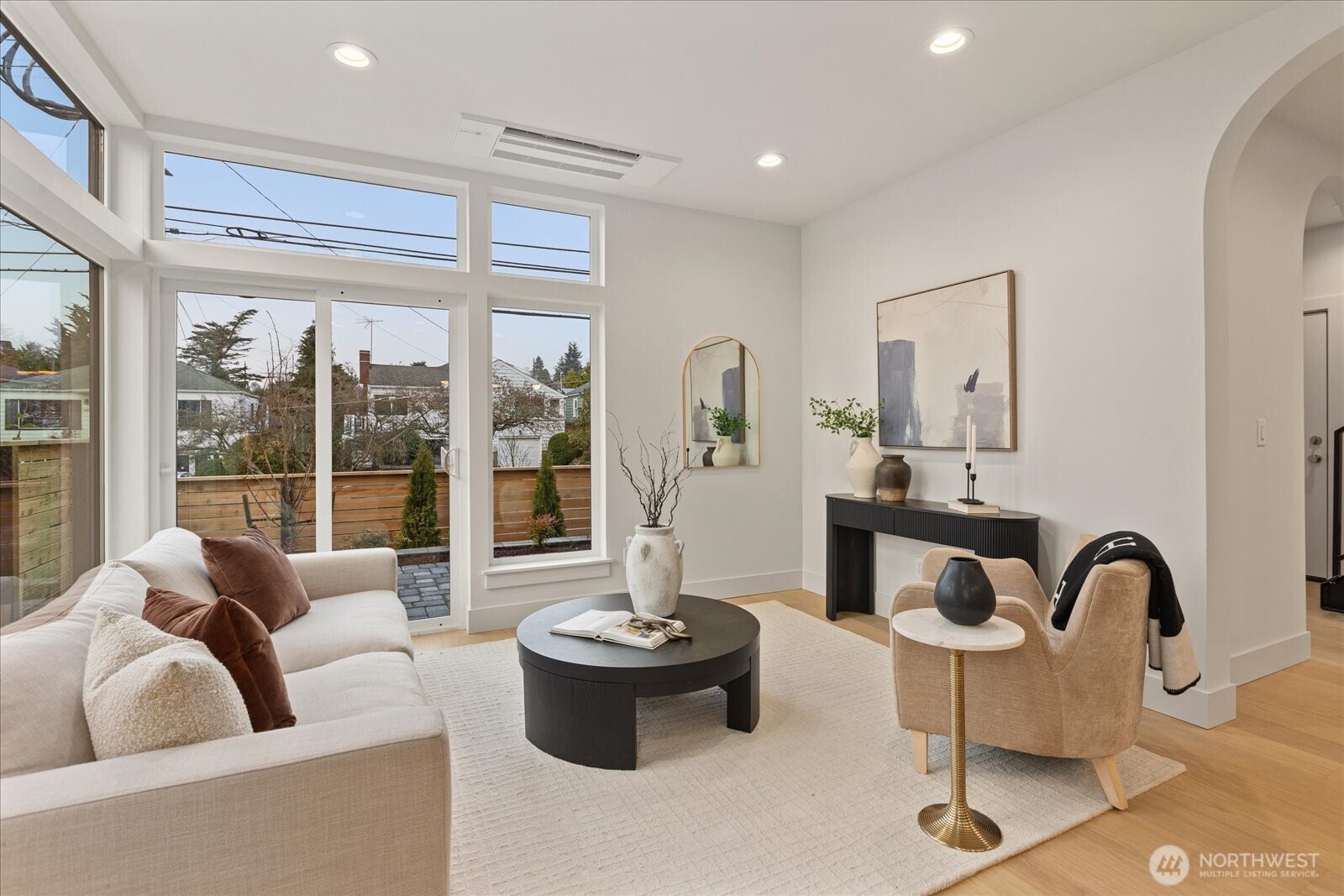 3409 Northwest 57th Street Seattle, WA 98107 - Photo 6 of 39 a living room with furniture and a potted plant
