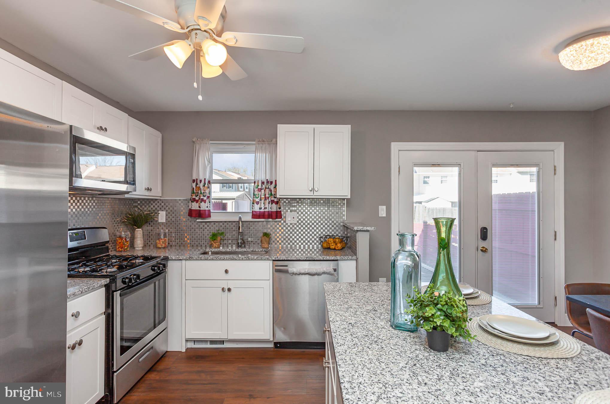 9662 Baron Place, Unit 9662 Rosedale, MD 21237 - Photo 13 of 35 Hardwood Kitchen