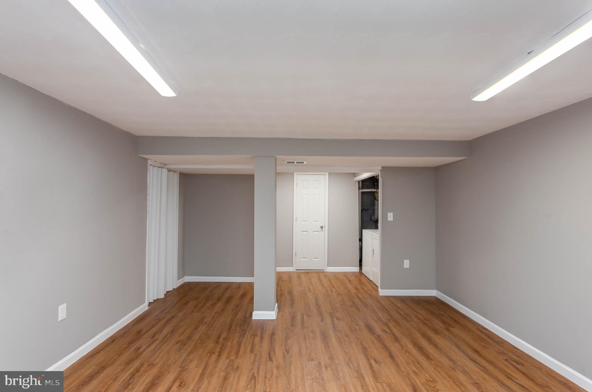 9662 Baron Place, Unit 9662 Rosedale, MD 21237 - Photo 25 of 35 Finished Basement Rec Room