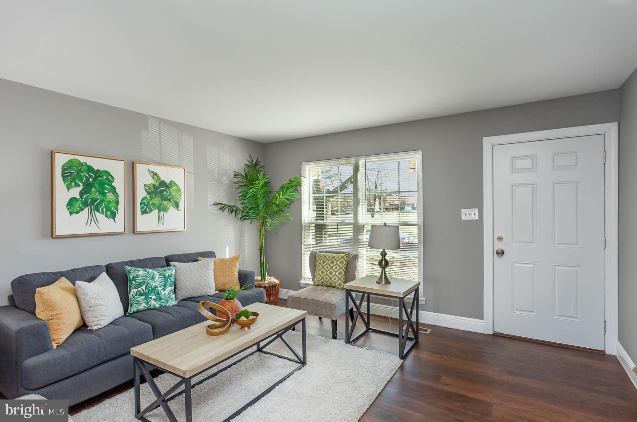9662 Baron Place, Unit 9662 Rosedale, MD 21237 - Photo 3 of 35 Hardwood Living Room