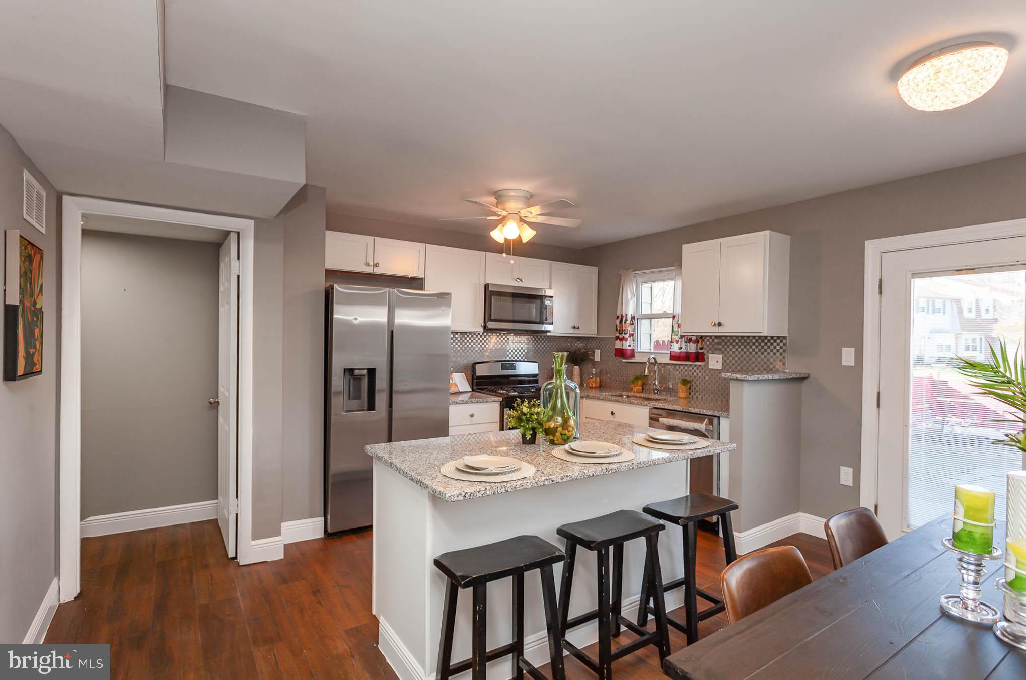 9662 Baron Place, Unit 9662 Rosedale, MD 21237 - Photo 8 of 35 Kitchen Island