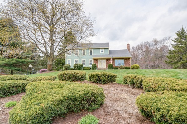 43 Robert Road Stow, MA 01775 - Photo 1 of 22 a front view of a house with a yard
