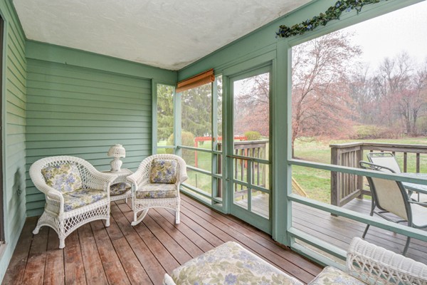 43 Robert Road Stow, MA 01775 - Photo 13 of 22 a balcony view with a seating space