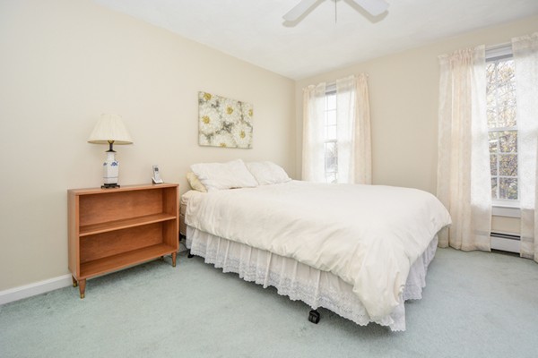 43 Robert Road Stow, MA 01775 - Photo 17 of 22 a bedroom with a bed and a window