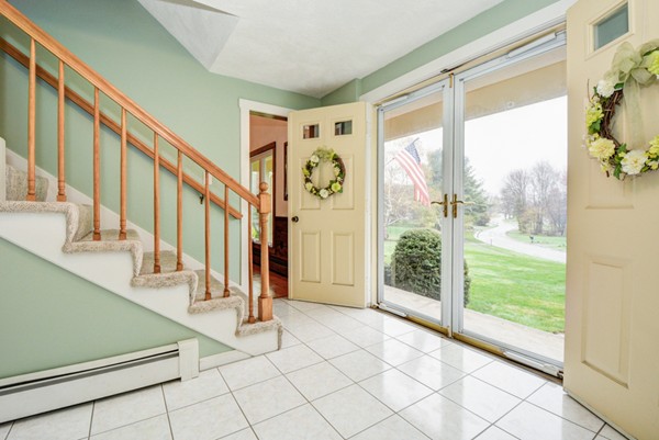 43 Robert Road Stow, MA 01775 - Photo 3 of 22 a view of an entryway with garden