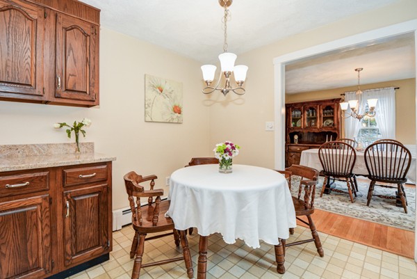 43 Robert Road Stow, MA 01775 - Photo 9 of 22 a view of a dining room with furniture