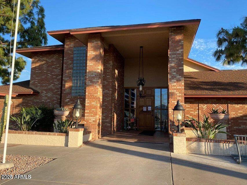 5735 East McDowell Road, Unit 63 Mesa, AZ 85215 - Photo 14 of 27 a view of a house with a patio