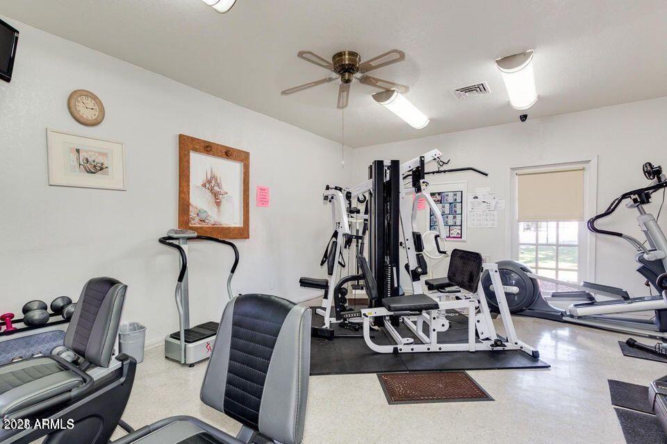 5735 East McDowell Road, Unit 63 Mesa, AZ 85215 - Photo 19 of 27 a view of a room with gym equipment