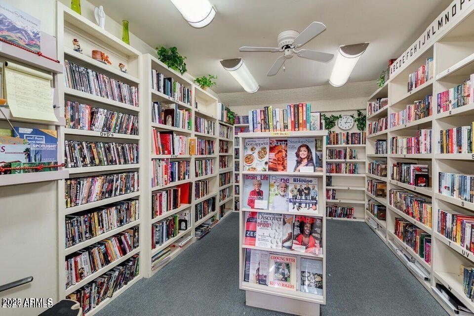 5735 East McDowell Road, Unit 63 Mesa, AZ 85215 - Photo 20 of 27 a book room with lots of books