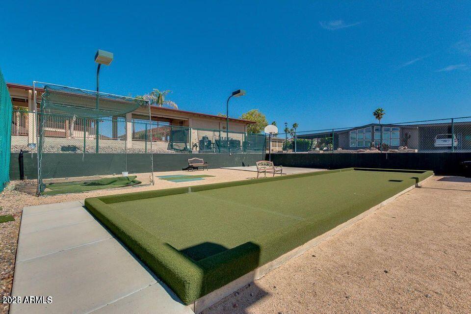 5735 East McDowell Road, Unit 63 Mesa, AZ 85215 - Photo 25 of 27 a view of a house with a swimming pool