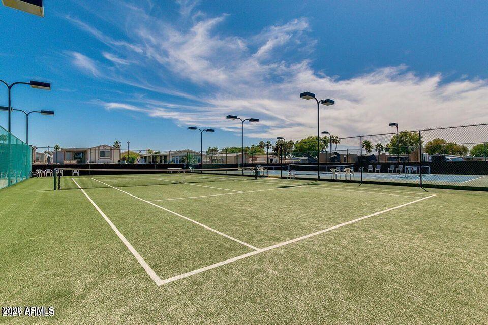 5735 East McDowell Road, Unit 63 Mesa, AZ 85215 - Photo 27 of 27 a view of a tennis court