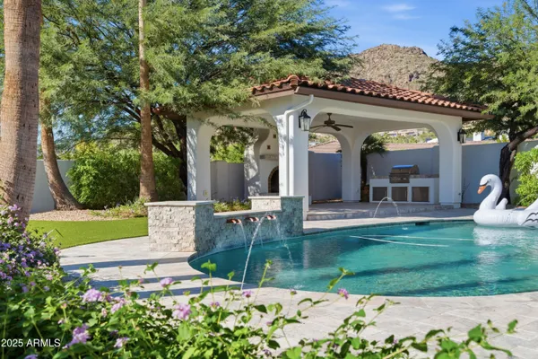 a view of a house with garden and front view of a house
