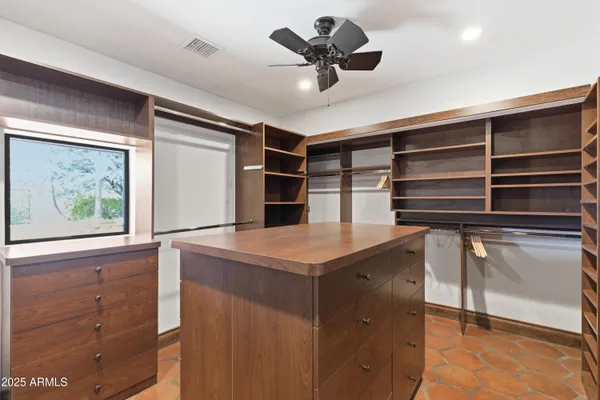 a kitchen with a stove and a microwave