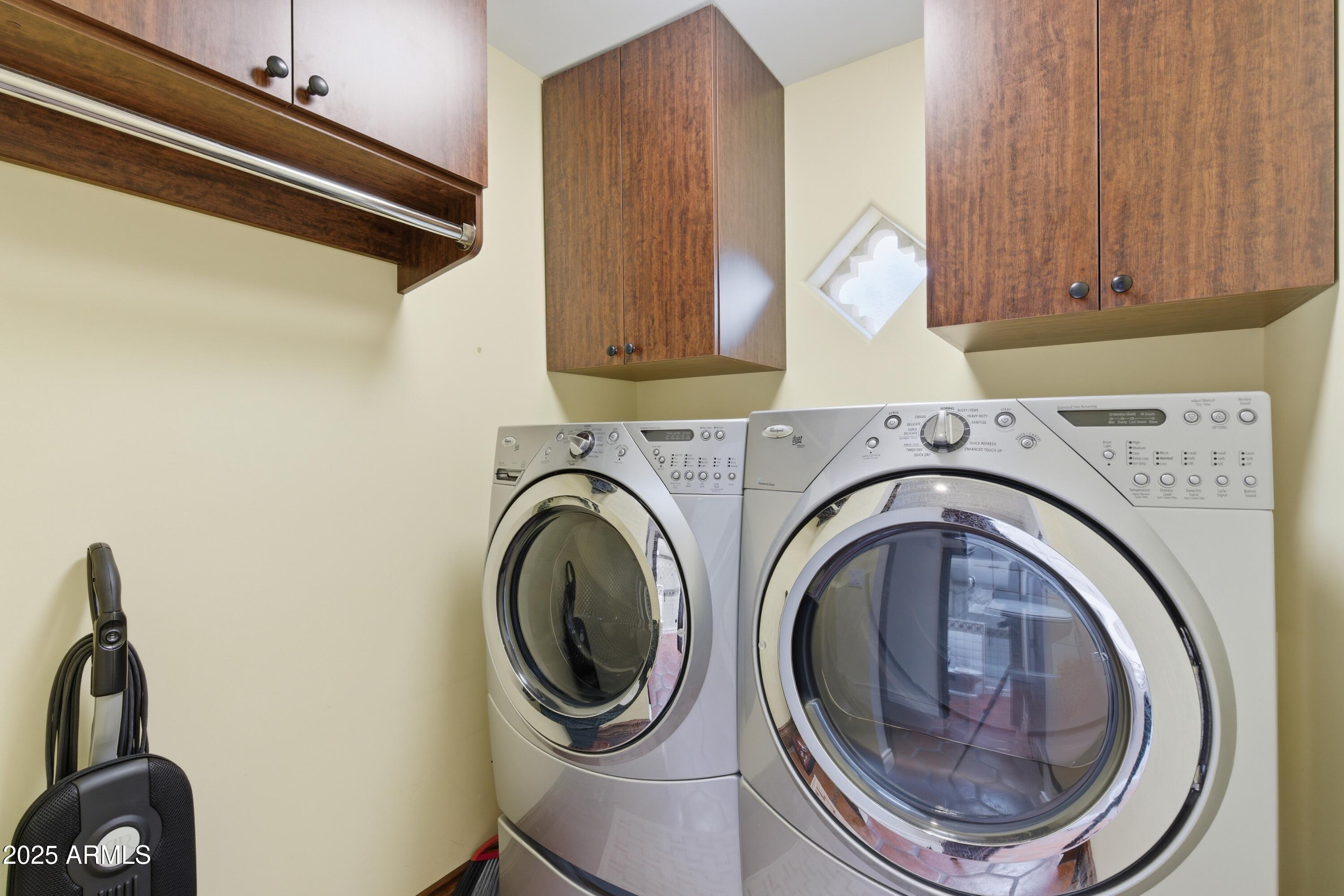 5828 East Cactus Wren Road Paradise Valley, AZ 85253 - Photo 36 of 44 a utility room with dryer and washer