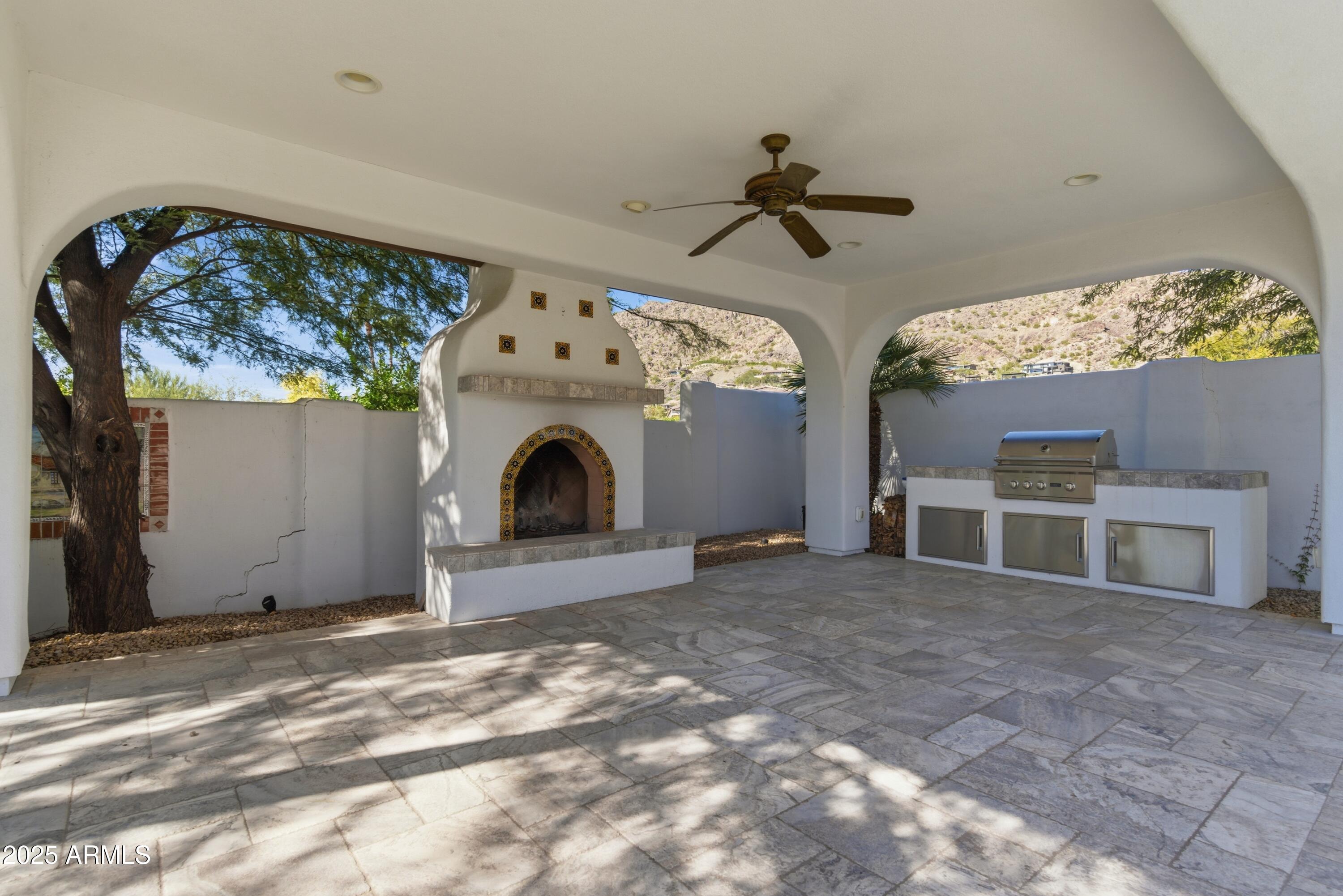 5828 East Cactus Wren Road Paradise Valley, AZ 85253 - Photo 37 of 44 a view of a livingroom with furniture and chandelier