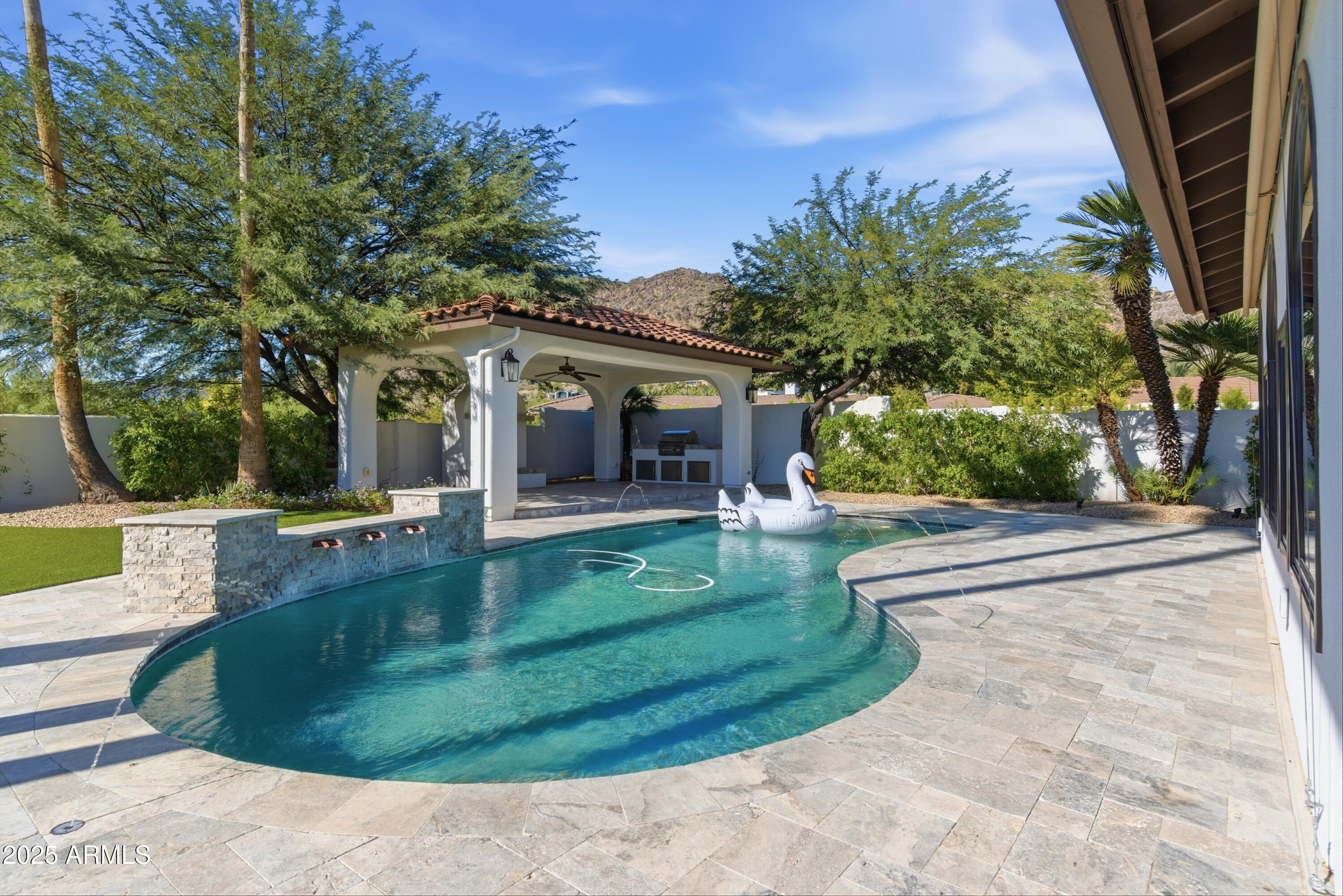 5828 East Cactus Wren Road Paradise Valley, AZ 85253 - Photo 41 of 44 a view of a house with backyard and sitting area