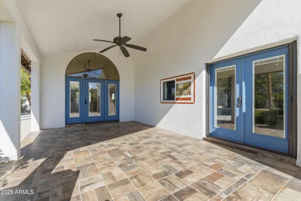 a view of a bedroom with windows