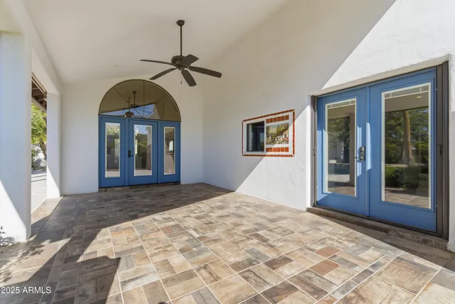a view of a bedroom with windows