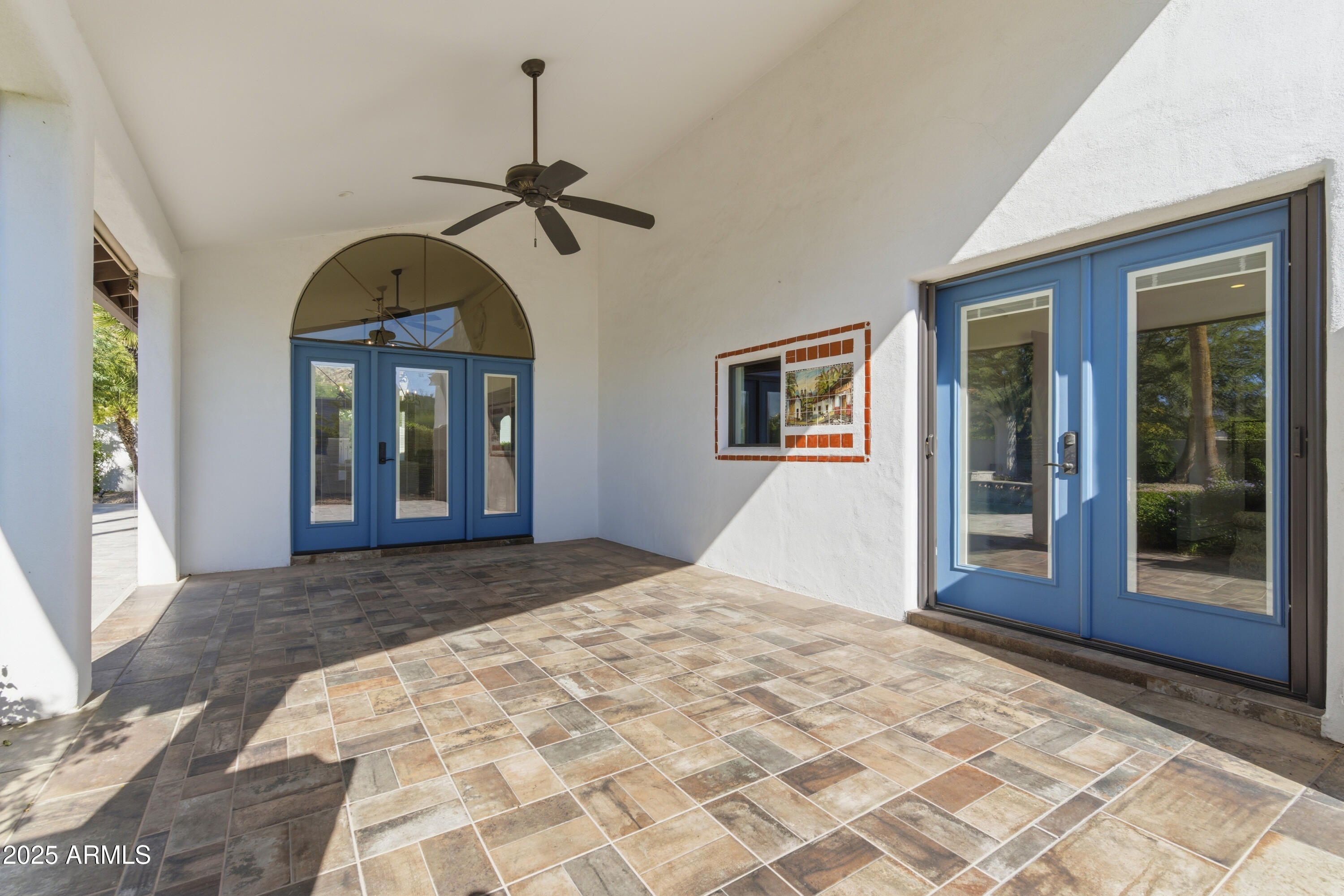 5828 East Cactus Wren Road Paradise Valley, AZ 85253 - Photo 42 of 44 a view of a bedroom with windows
