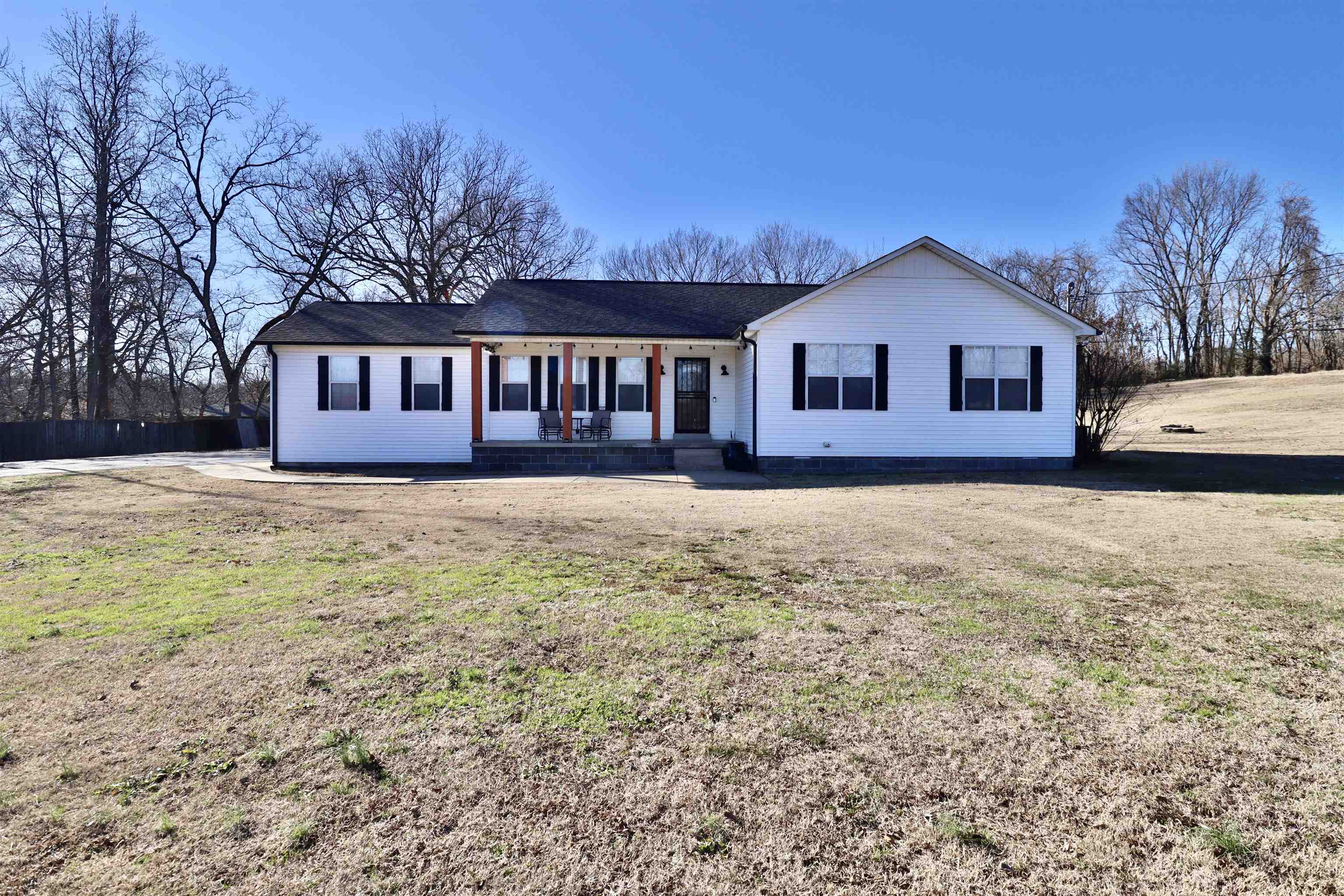 front view of a house with a yard