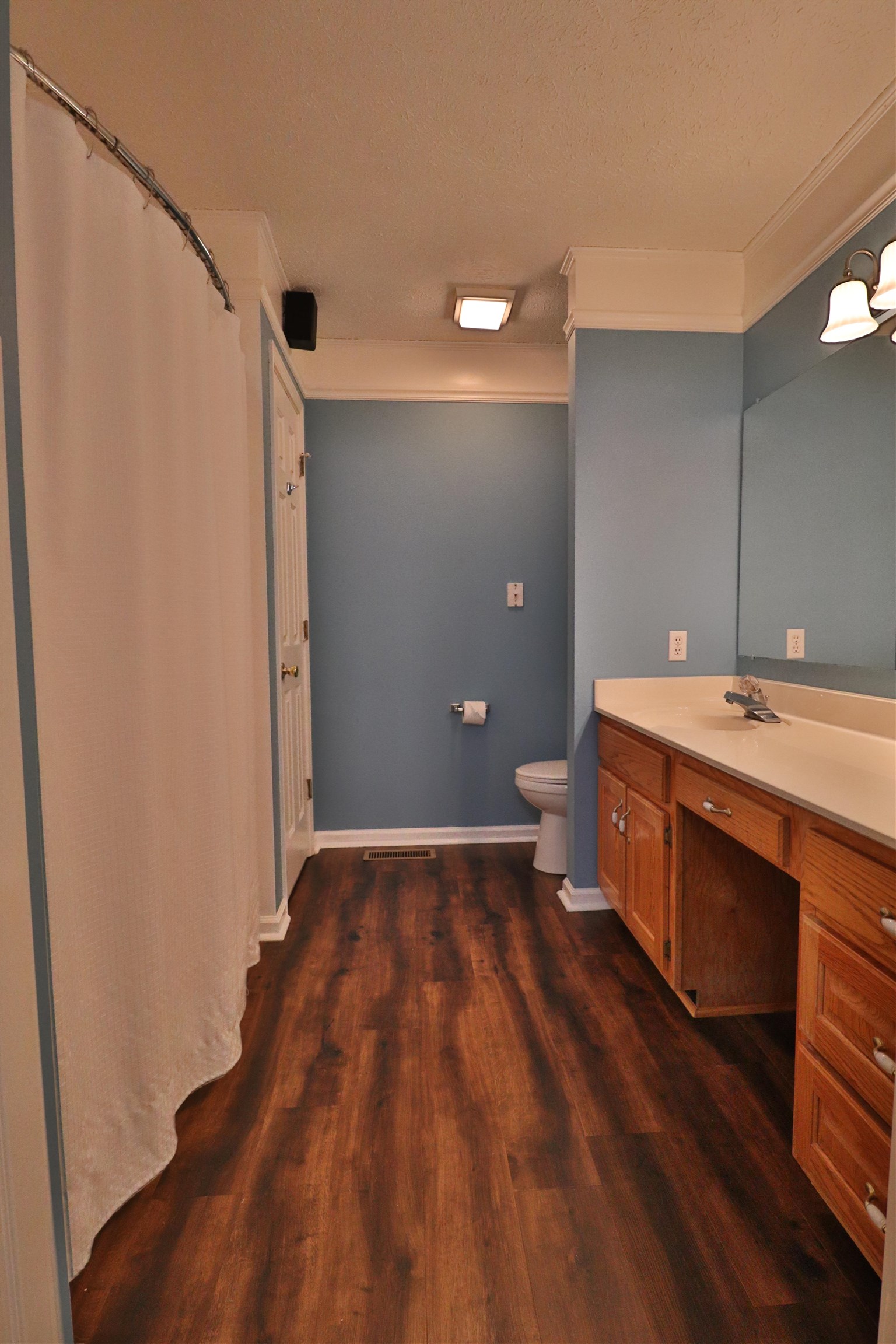 302 Ford Store Road Ripley, TN 38063 - Photo 18 of 40 a bathroom with a sink and a mirror