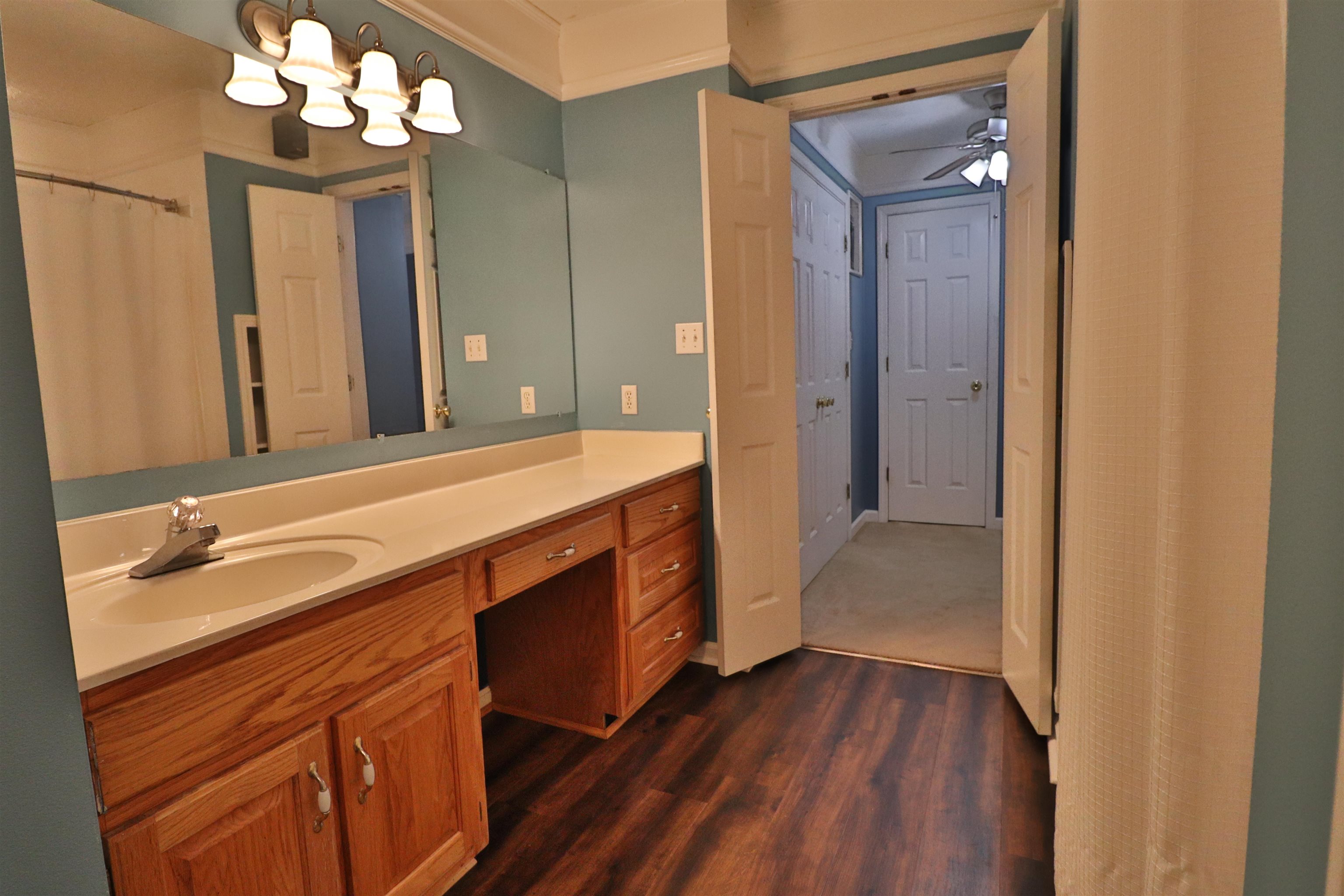 302 Ford Store Road Ripley, TN 38063 - Photo 19 of 40 a bathroom with a sink and a mirror