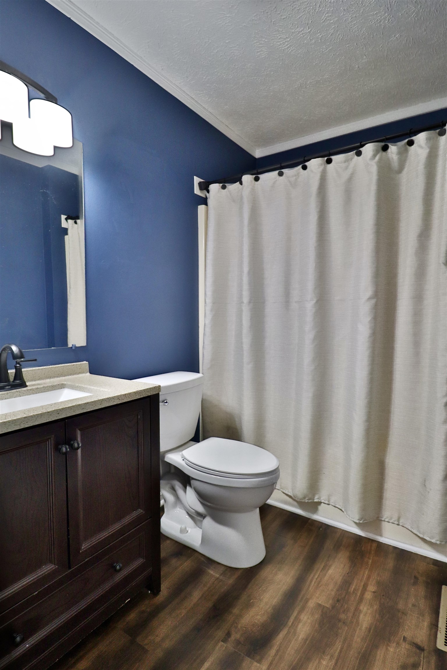 302 Ford Store Road Ripley, TN 38063 - Photo 24 of 40 a bathroom with a sink and a toilet