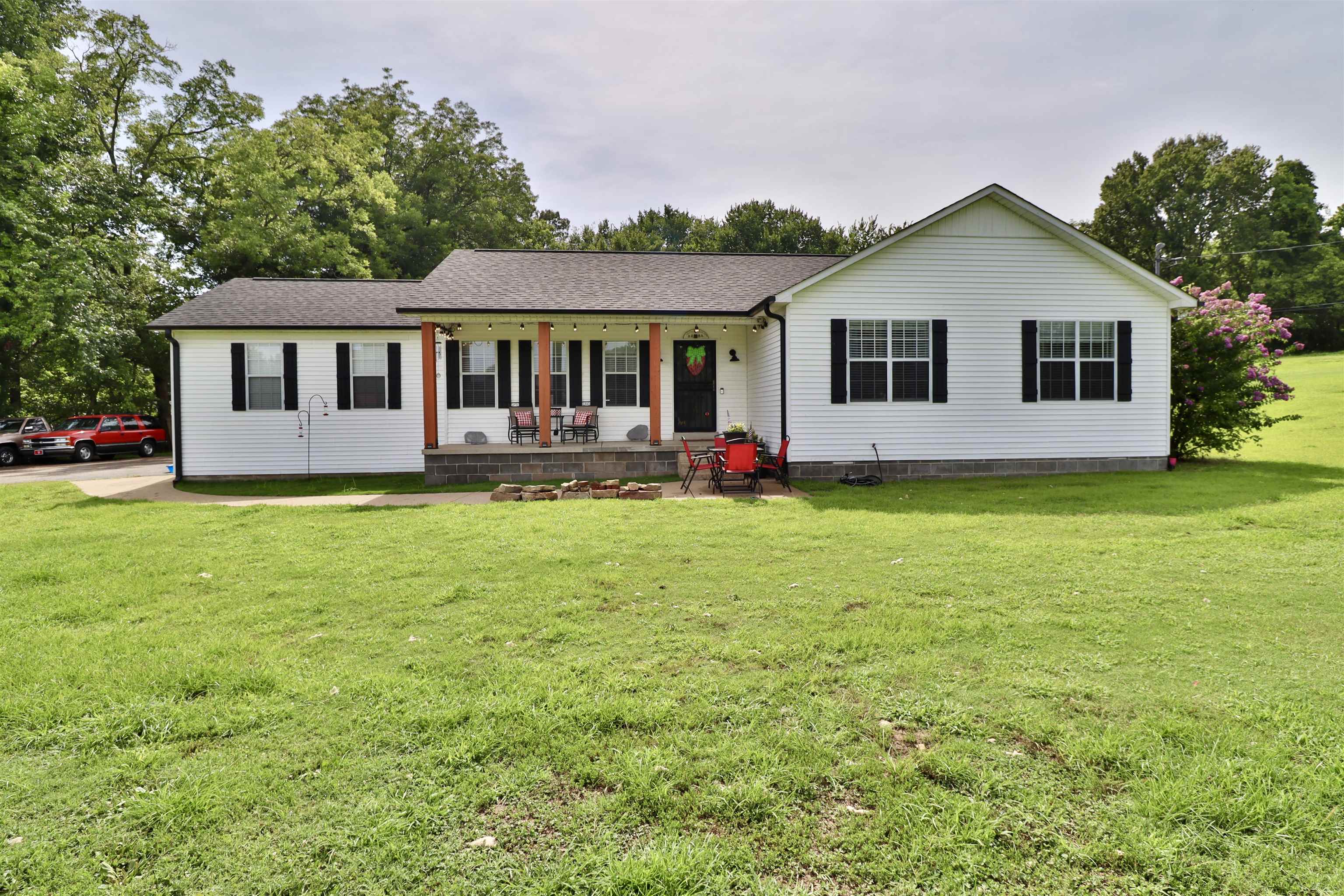 302 Ford Store Road Ripley, TN 38063 - Photo 28 of 40 a front view of a house with garden