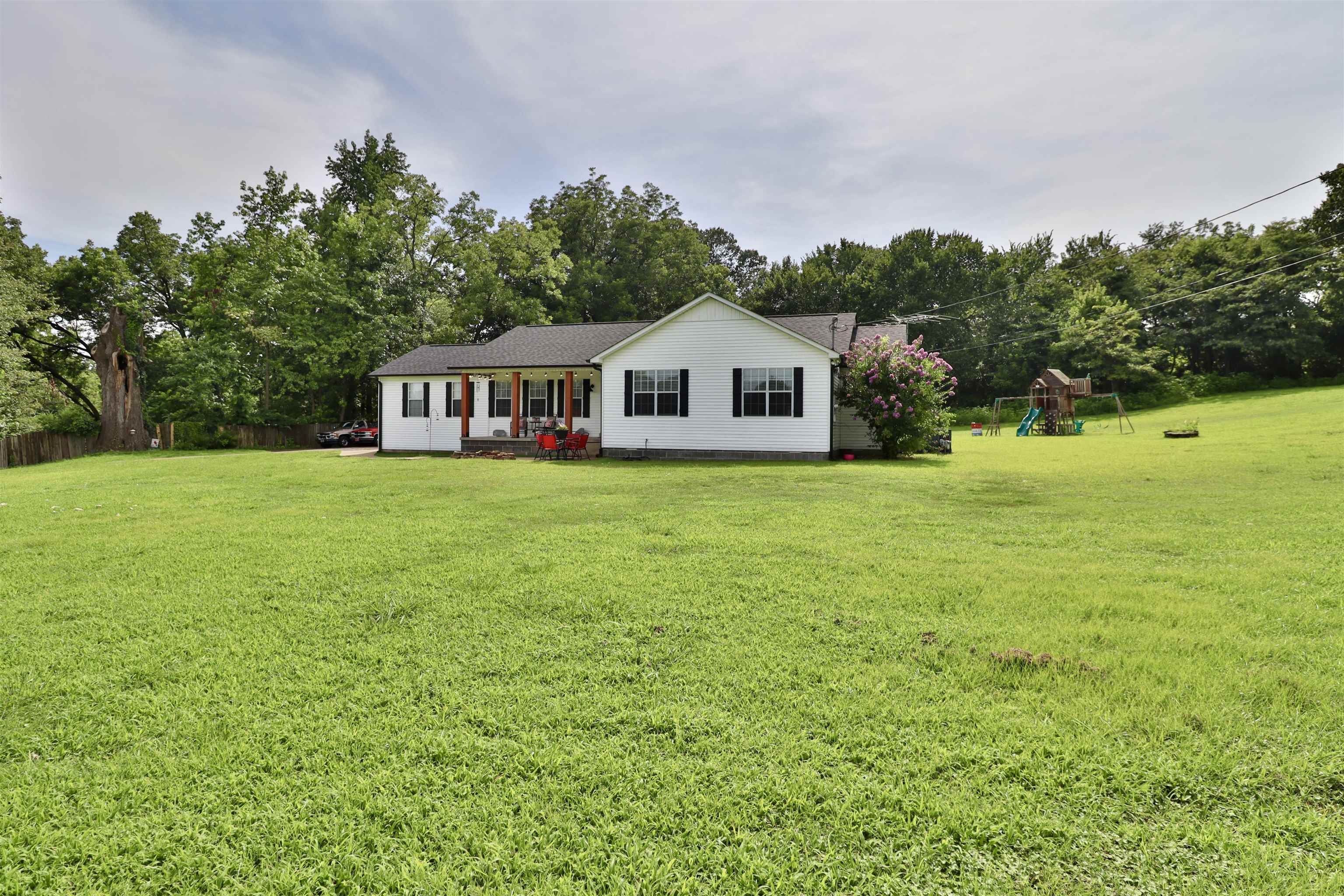 302 Ford Store Road Ripley, TN 38063 - Photo 32 of 40 a view of a house with a big yard