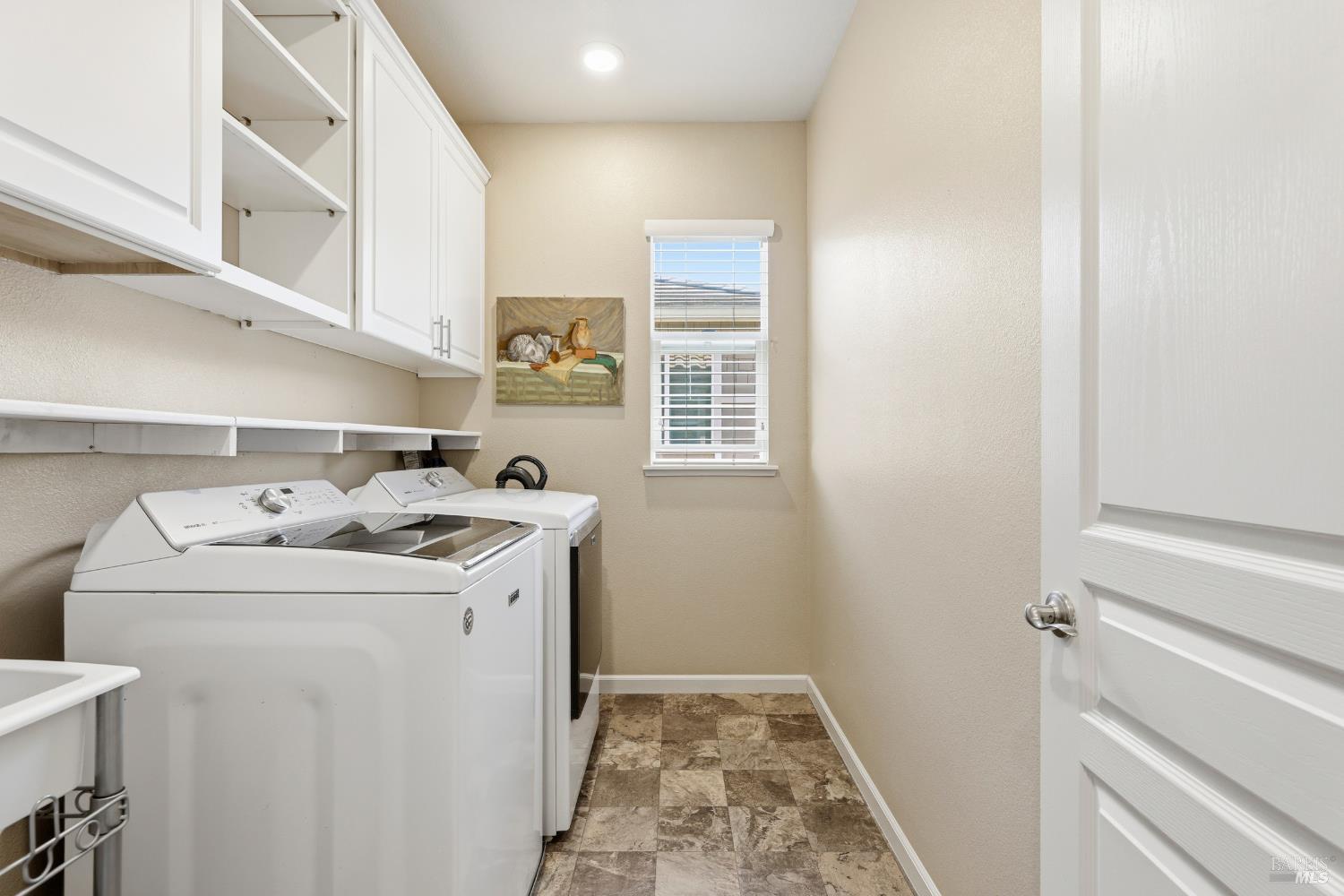 5533 Kennedy Place Rohnert Park, CA 94928 - Photo 21 of 63 a utility room with dryer and washer