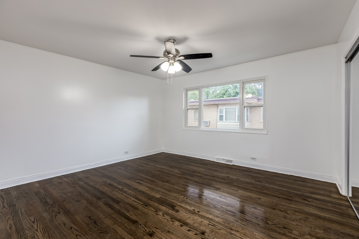 5107 North Springfield Avenue, Unit B Chicago, IL 60625 - Photo 14 of 25 a view of empty room with wooden floor