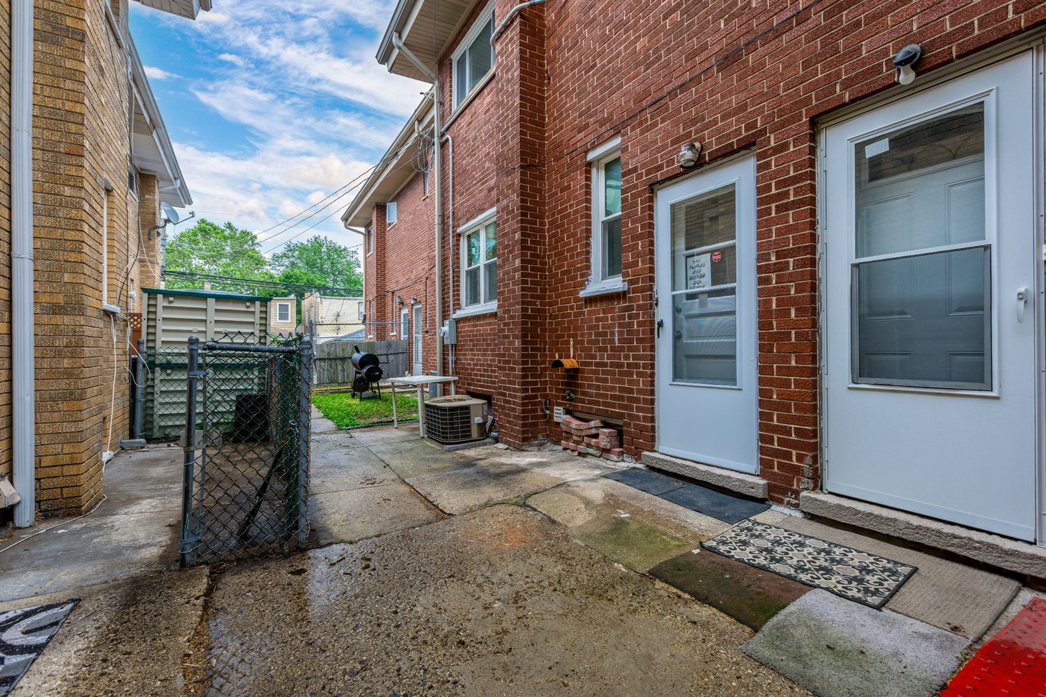 5107 North Springfield Avenue, Unit B Chicago, IL 60625 - Photo 25 of 25 a view of a brick house with a large windows