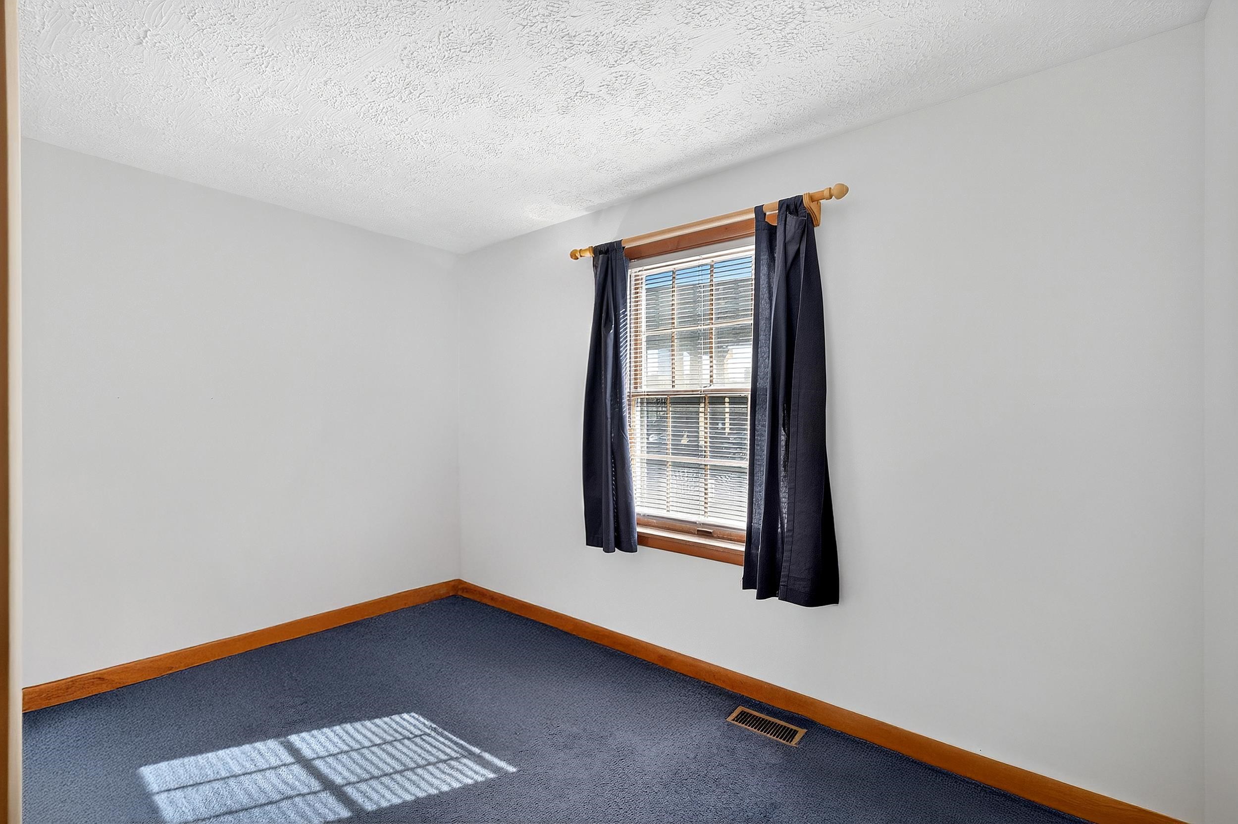 87 Merseles Street, Unit 2 Jersey City, NJ 07302 - Photo 15 of 16 an empty room with windows