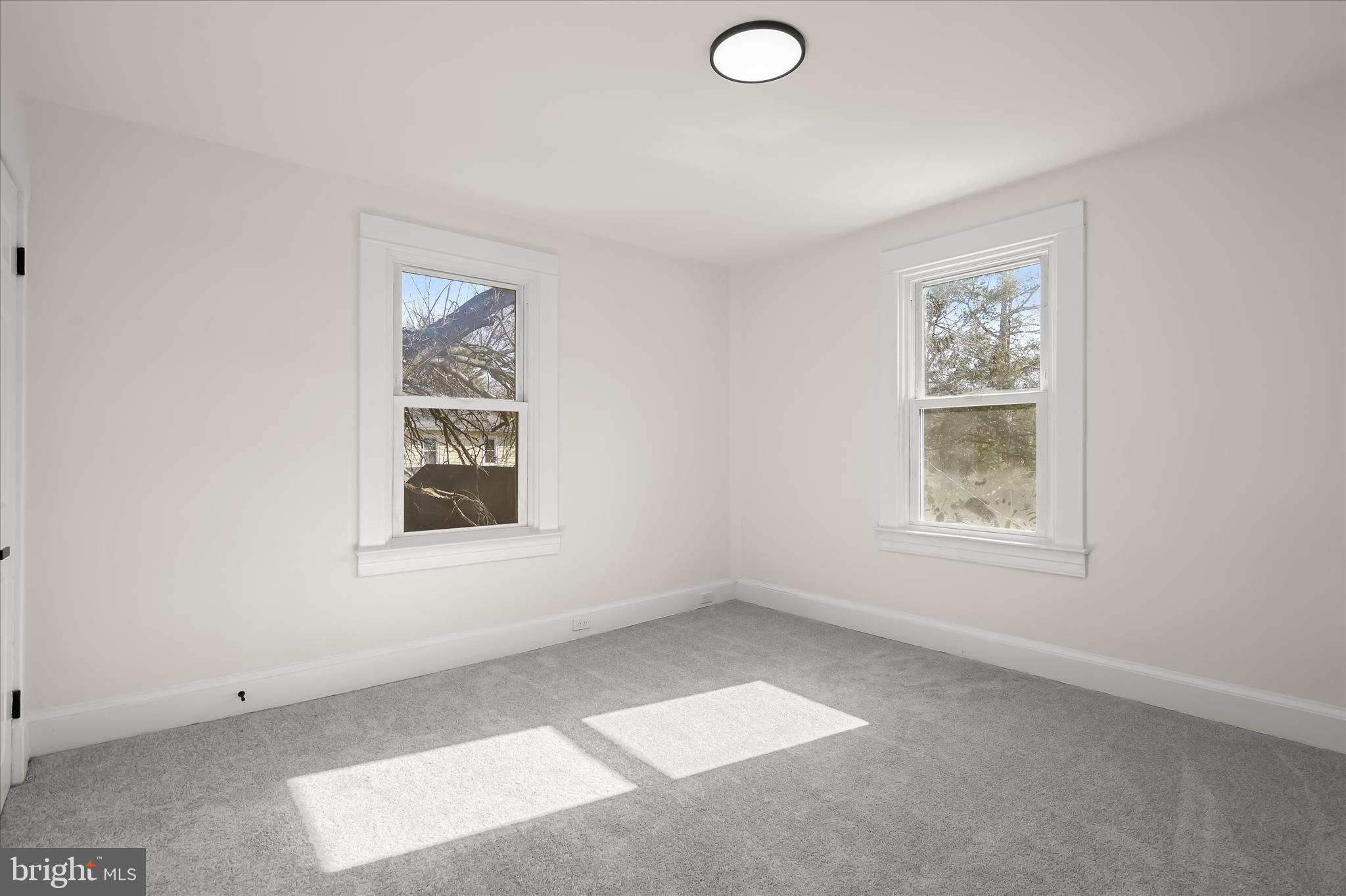 1236 Elm Ridge Avenue Baltimore, MD 21229 - Photo 21 of 41 an empty room with windows