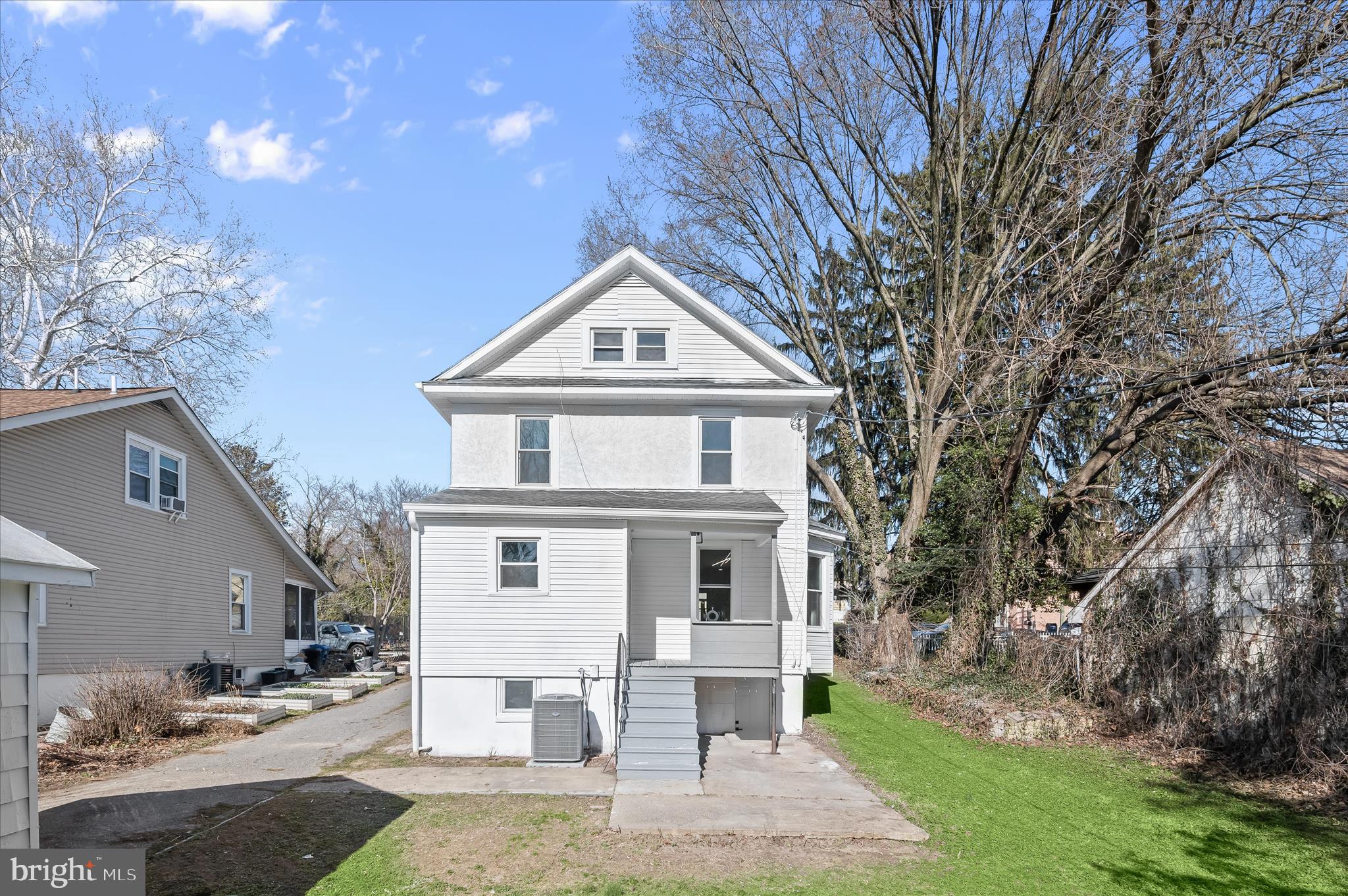 1236 Elm Ridge Avenue Baltimore, MD 21229 - Photo 35 of 41 a front view of a house with a yard