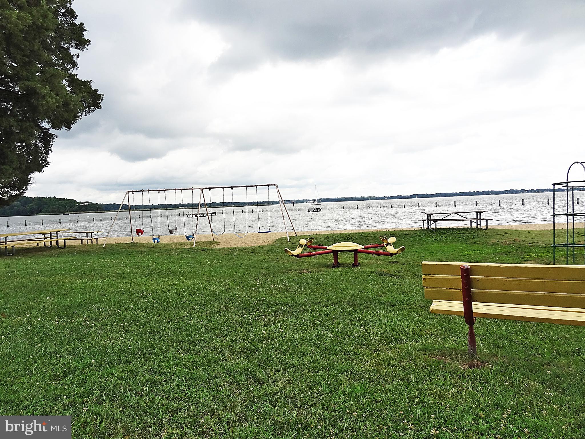 3620 Calvert Street Edgewater, MD 21037 - Photo 29 of 30 COMMUNITY BEACH, PLAYGROUND, BOAT RAMP AND COURTS