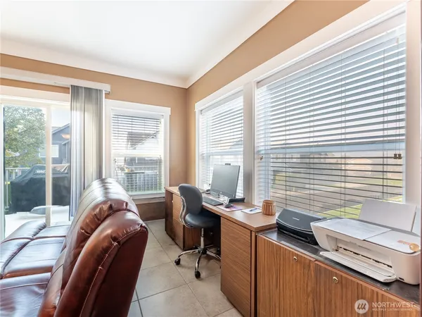 a kitchen with stainless steel appliances wooden cabinets and a stove top oven
