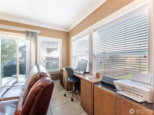 a kitchen with stainless steel appliances wooden cabinets and a stove top oven