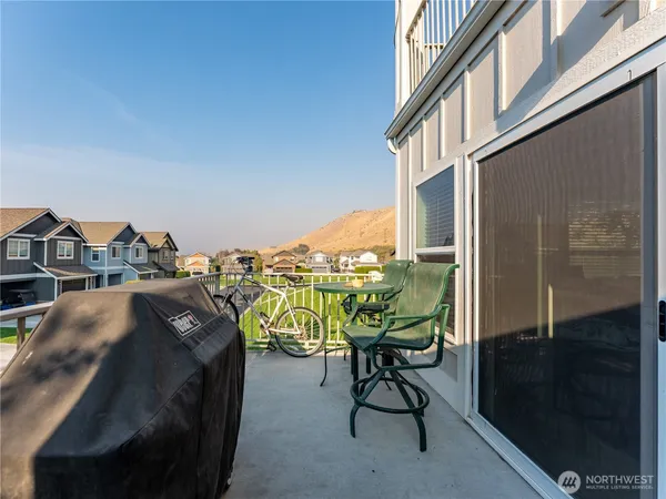 a view of a garden with mountains in the background