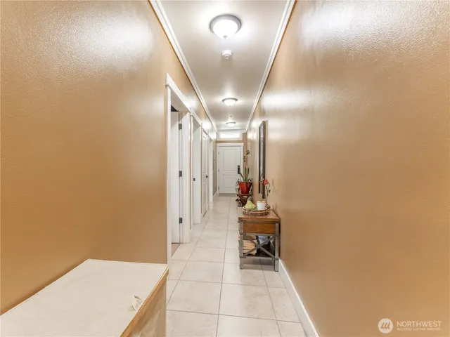 a kitchen with stainless steel appliances granite countertop a stove and cabinets