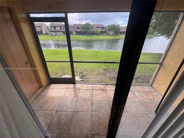 a view of a large window with an outdoor space