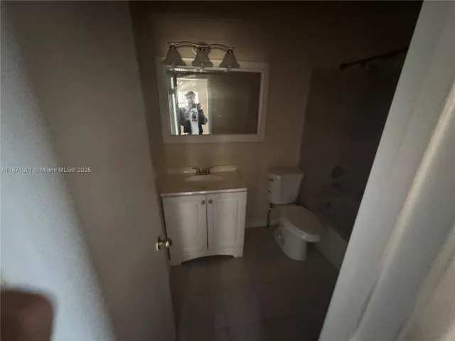 a bathroom with a toilet