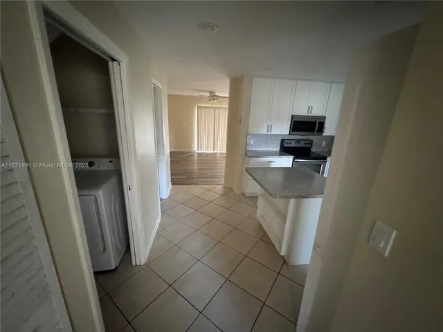 a bathroom with a sink a toilet and a shower