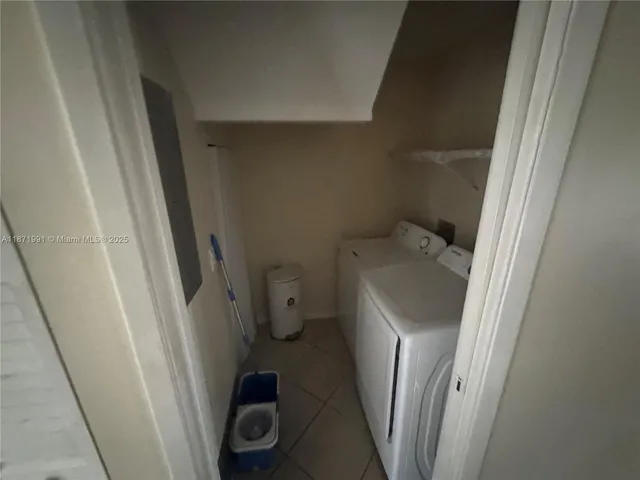 a bathroom with a sink and toilet
